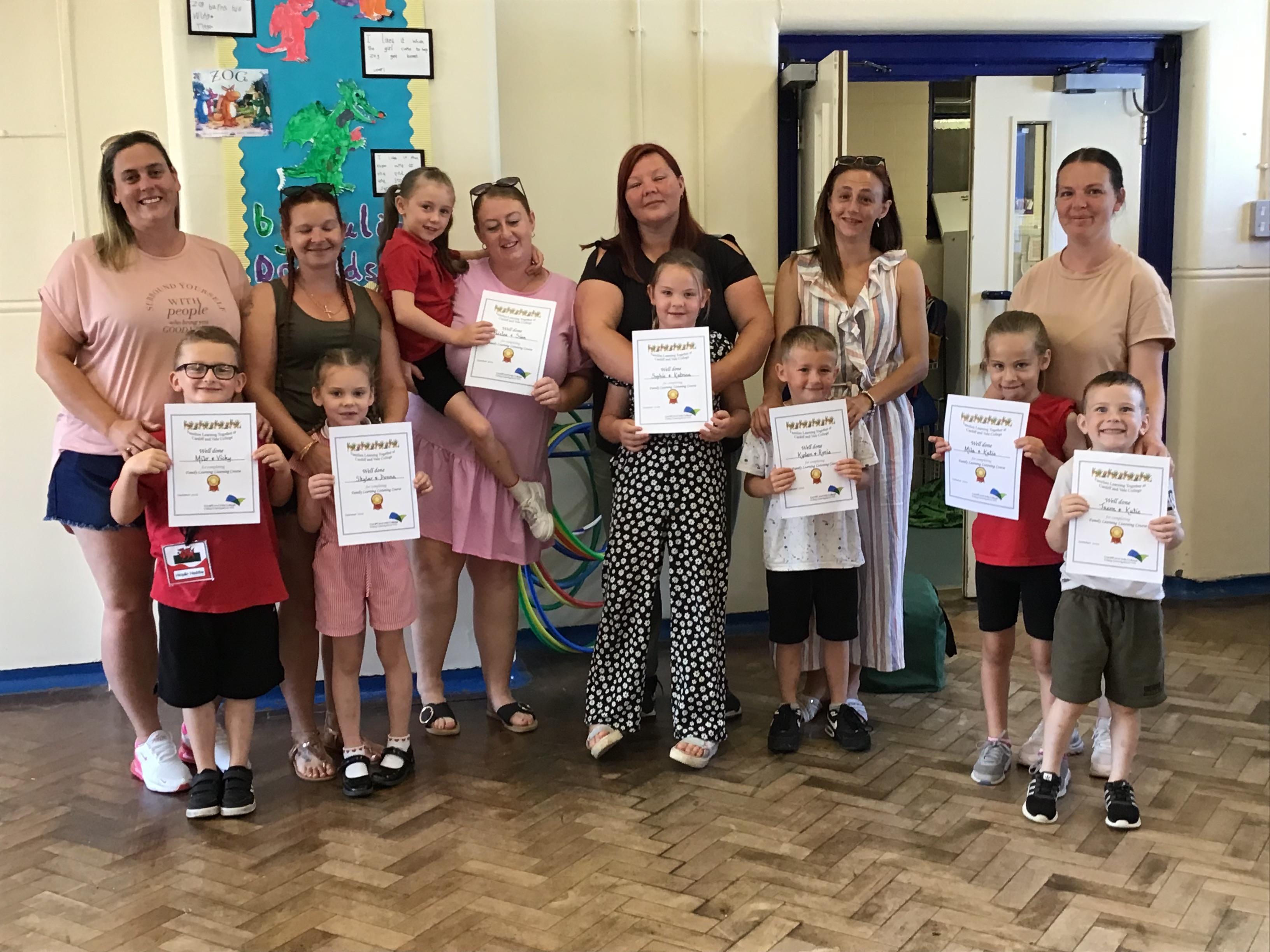 families receiving their certificates